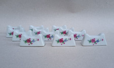 12 anciens porte couteaux en