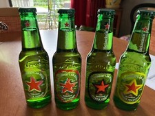 4 bouteilles Heineken