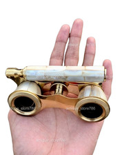Anciennes jumelles de verres d'opéra vintage blanche nacre et manche laiton