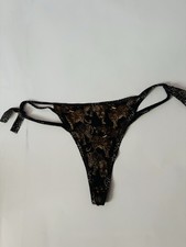 string sexy Aubade taille 4/42/L motifs animaliers 