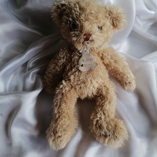 Doudou ours fourrure marron