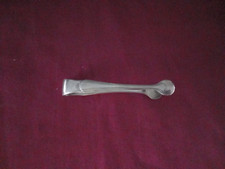 1 pince a sucre ou a olive en