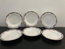 Suite de 6 assiettes creuses