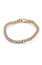 Gourmette en or jaune 14 carats 585/1000 et diamants