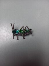 broche sauterelle métal