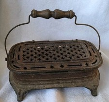 Chaufferette poêle à pieds