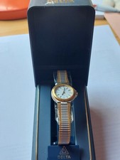 Montre femme delta quartz pile à remplacer