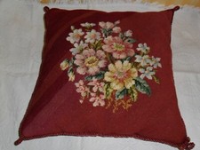 Antique French tapestry pillow, hand made.Flowers on a burgundy back ground.