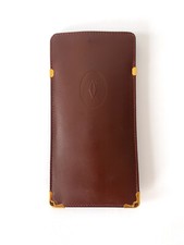 Étui à lunettes vintage Cartier en cuir bordeaux et laiton doré – Années 1980