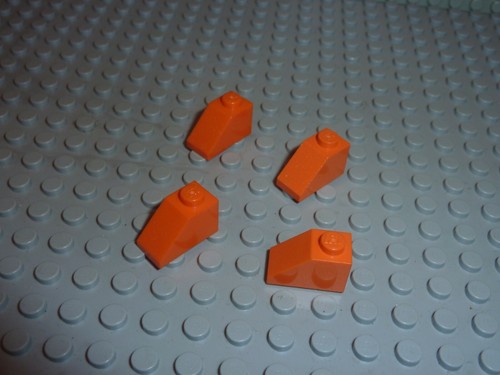 Lego orange slope bricks - 4,