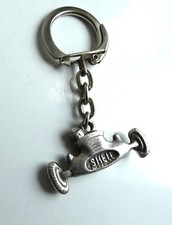 Ancien porte clé Automobile Shell Garage Station Compétiton Formule 1. Bolide.