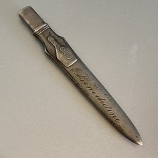 ancien porte crayon publicitaire Liqueur bénédictine métal Argenté