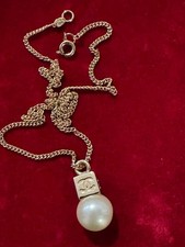 Collier pendentif CHANEL doré