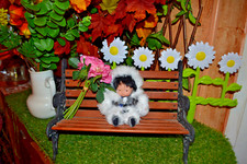 poupon corolle asiatique en habit polaire c'est ravissant en parfait etat