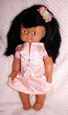 Jolie poupée  asiatique PIMA