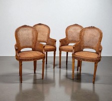 SERIE DE 4 FAUTEUILS CANNÉS EN NOYER SCULPTÉ  DE STYLE LOUIS XVI DES ANNÉES 1900
