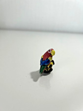 Joli petit perroquet ara en céramique