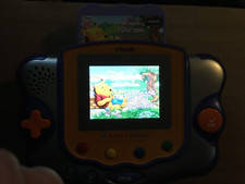 console vsmile pocket vtech orange avec jeux winnie vf testée et fonctionnelle
