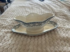 Saucière ancienne en faïence