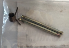 Axe ressort porte tambour