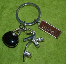 Beau porte clés à breloques