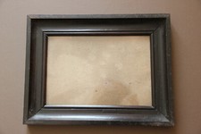 Cadre ancien noir avec vitre.