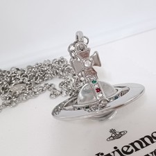 Vivienne Westwood- Grand collier 3D Orbe transparent et plaqué argent .