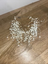 Collier Flottant en Perles