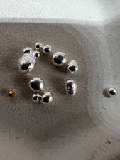 3 Grammes d'argent fin  + 1 bille or pur 24 carats 999.99%