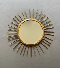 Miroir soleil en métal doré