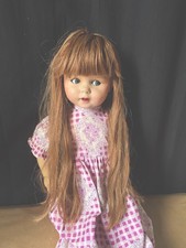 Longue perruque poupée