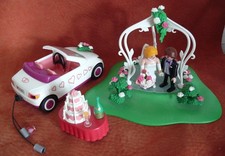 Couple de mariés avec voiture, fleurs, gâteau, champagne - Playmobil 6871