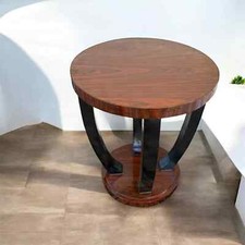 Table basse ronde en bois – Base à gradins sculptée
