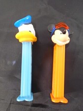 ANCIENS DISTRIBUTEURS PEZ MICKEY DONALD BONBONS PLASTIQUE