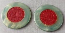 Paire d'anciens jetons de
