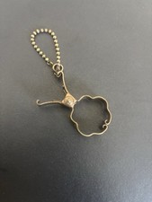 Ancien pince à jupe