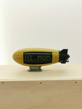 1991 Rare Hotwheels Blimp Dirigible Toy - Hi Mom & Top speed GT