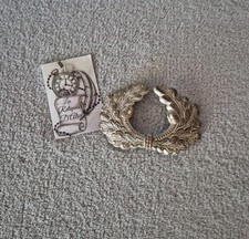 Insigne couronne de casquette