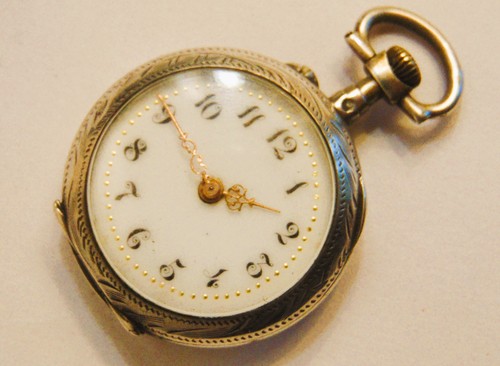Belle montre ancienne col - belle,
