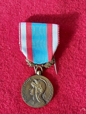 médaille commemorative  d'Afrique du nord avec boite signé J Carlier en bronze