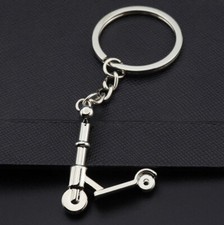 Porte-clés, bijou de sac trottinette en acier argenté