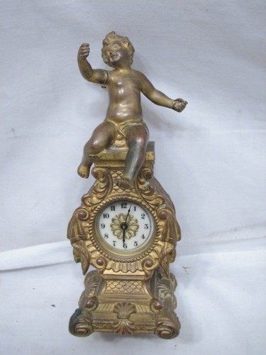 Early waterbury cherub - early, ornate
