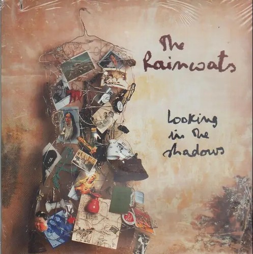 The raincoats looking in - the,