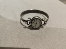 Montre vintage femme en argent