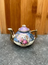 Petite théière de dinette