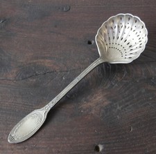 Cuillère à saupoudrer en