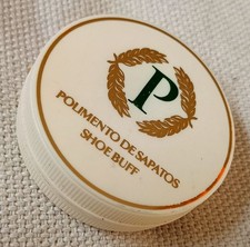 Souvenir de l'hôtel Polana, à Maputo, Mozambique. Boîte de cirage en plastique