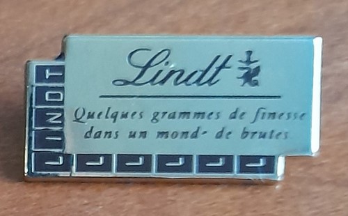 Pin chocolat lindt signé - pin's,