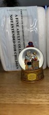 2011 disney holiday snowglobe - 2011,