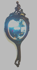 petit miroir à mains en bois finement sculpté miroir biseauté . XIX siècle .